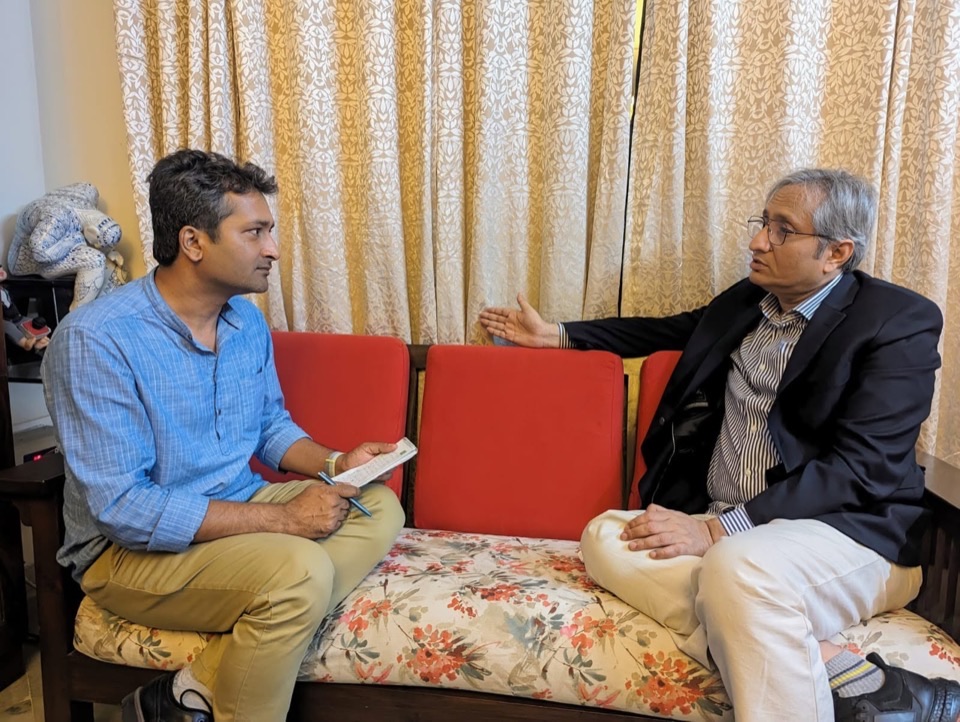 Akhil Ranjan interviewing journalist Ravish Kumar